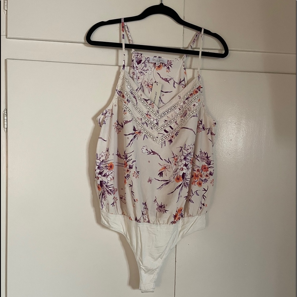 Love and piece printed bodysuit by Francesca’s
